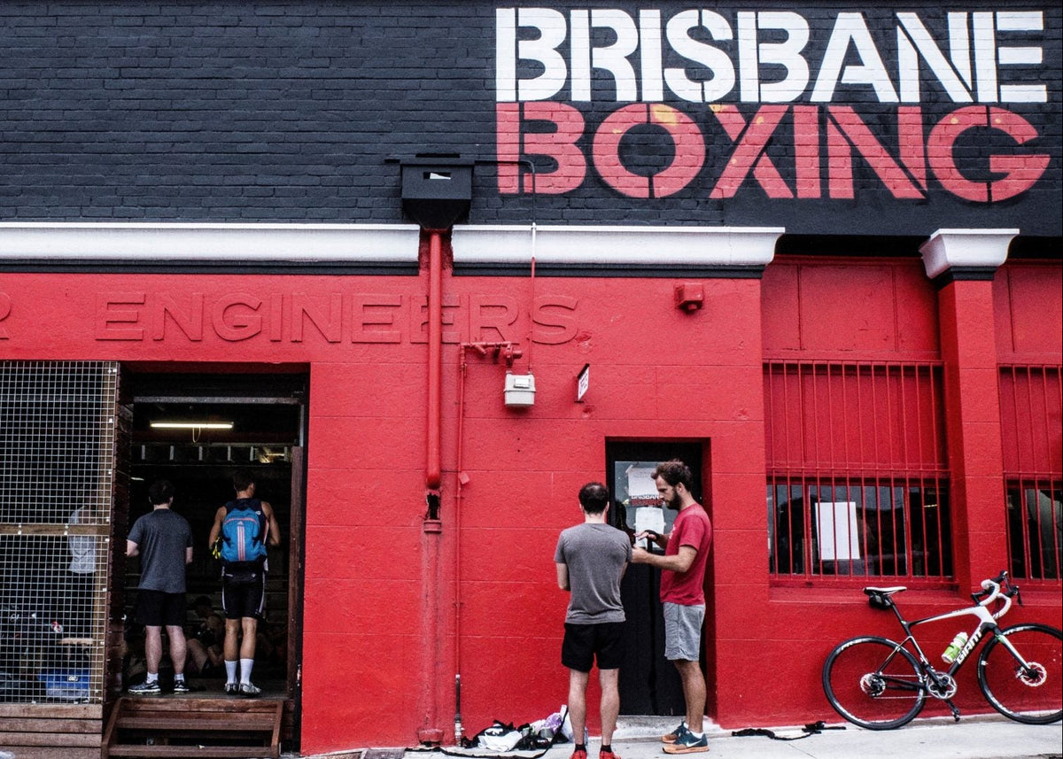 Training floor, boxing rings and hanging bags inside Brisbane Boxing Mt Gravatt / MacGregor.