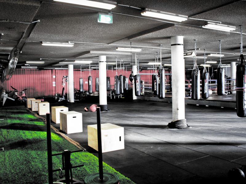 Training floor, boxing rings and hanging bags inside Brisbane Boxing Mt Gravatt / MacGregor.